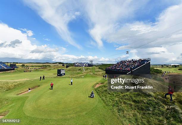 Danny Willett of England hits a bunker shot on the 8th during a practice round ahead of the 145th Open Championship at Royal Troon on July 13, 2016...