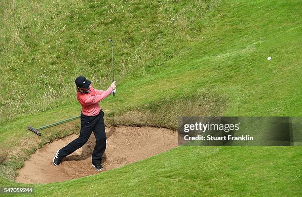 Tommy Fleetwood of England hits a bunker shot on the 8th during a practice round ahead of the 145th Open Championship at Royal Troon on July 13, 2016...