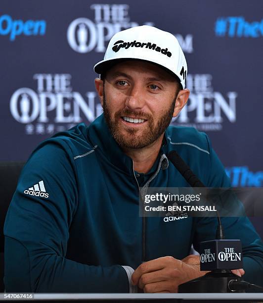 Golfer Dustin Johnson smiles as he speaks to members of the media at a press conference on July 13 ahead of the 2016 British Open Golf Championship...