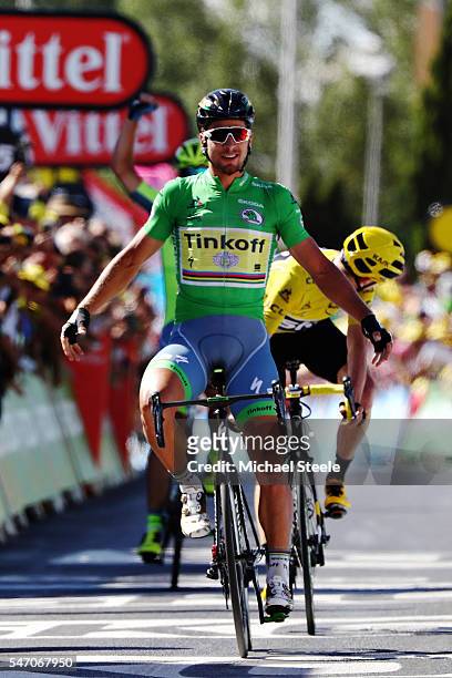 Peter Sagan of Slovakia riding for Tinkoff in the green sprinters jersey takes the stage win from Chris Froome of Great Britain riding for Team Sky...