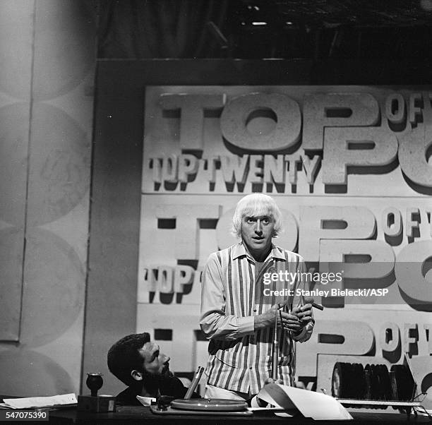 Jimmy Savile presenting Top of the Pops TV show, London, 1965.