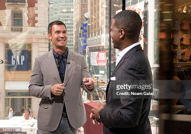 Calloway interviews actor Jeff Lewis during his visit to "Extra" at H&M Times Square on July 13, 2016 in New York City.