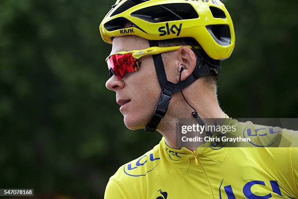 Christopher Froome of Great Britain riding for Team Sky in the yellow leader's jersey prepares to start stage eleven of the 2016 Le Tour de France a...