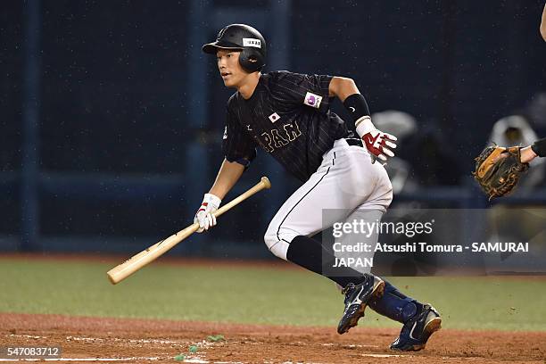 Yota Kyoda of Japan attempts to bunt in the top half of the fifth inning during the day 2 match between USA and Japan during the 40th USA-Japan...