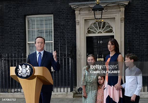 Outgoing British prime minister David Cameron speaks beside his daughter Nancy Gwen, daughter Florence Rose Endellion, his wife Samantha Cameron and...