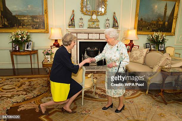 Queen Elizabeth II welcomes Theresa May at the start of an audience where she invited the former Home Secretary to become Prime Minister and form a...