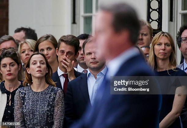 Downing Street staff watch as David Cameron, U.K.'s outgoing prime minister, delivers a speech outside 10 Downing Street in London, U.K., on...