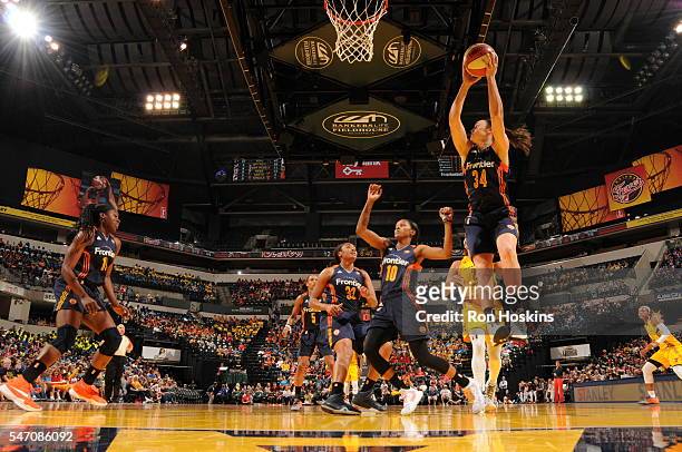 Kelly Faris of the Connecticut Sun grabs the rebound against the Indiana Fever at Bankers Life Fieldhouse on July 13, 2016 in Indianapolis, Indiana....