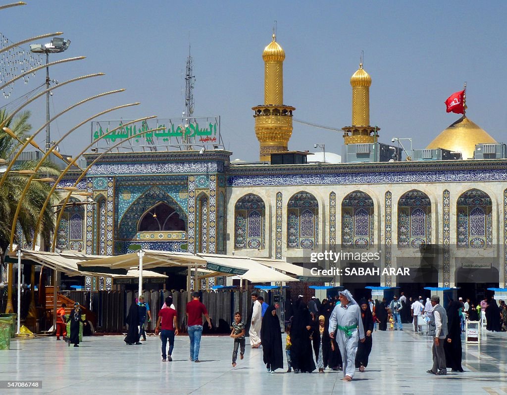 Muslims In Iraq Iraqi Shiite Muslims walk in front of the shrine of Imam Hussein, a ...
