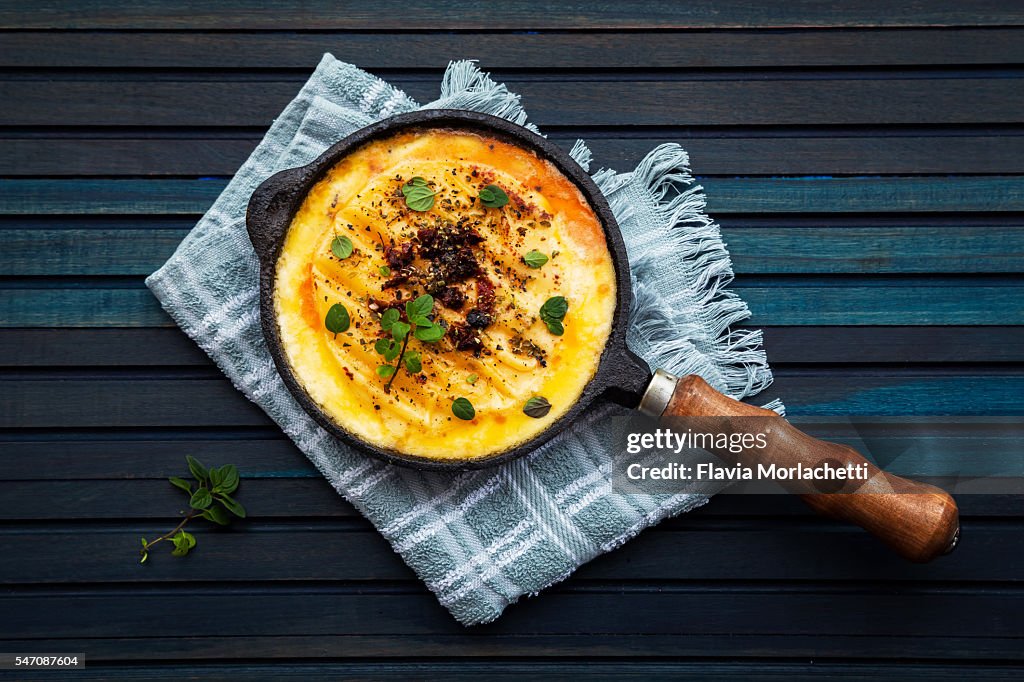 Melted provolone cheese (provoleta)
