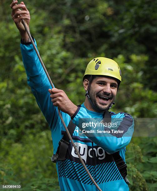 Aleksandar Mitrovic laughs whilst holding the ropes during the team building activity during the Newcastle United Training Camp at Carton House on...