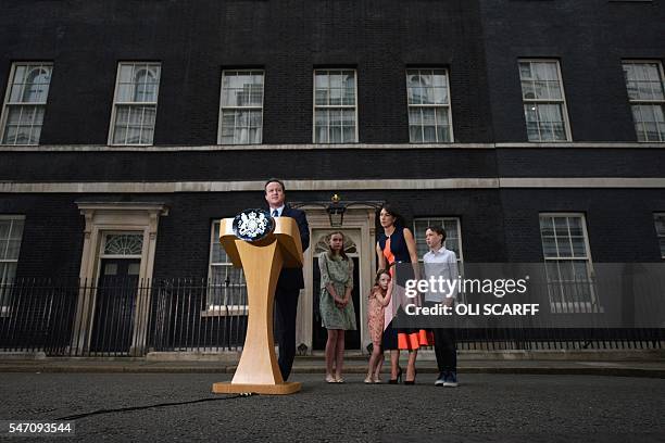 Outgoing British prime minister David Cameron speaks beside his daughter Nancy Gwen, daughter Florence Rose Endellion, his wife Samantha Cameron and...