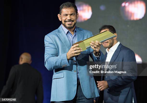 Antonio Rodrigo "Minotauro" Nogueira sraises his award as he is inducted into the UFC Hall of Fame at the Las Vegas Convention Center on July 10,...