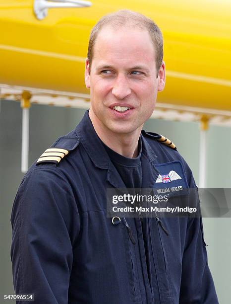 Prince William, Duke of Cambridge attends the opening, by Queen Elizabeth II, of the East Anglian Air Ambulance base at Cambridge Airport on July 13,...