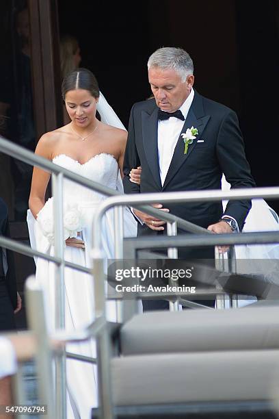 Ana Ivanovic and her father Miroslav Ivanovic leave the Aman Grand Canal Hotel to reach the church for the wedding to Bastian Schweinsteiger on July...