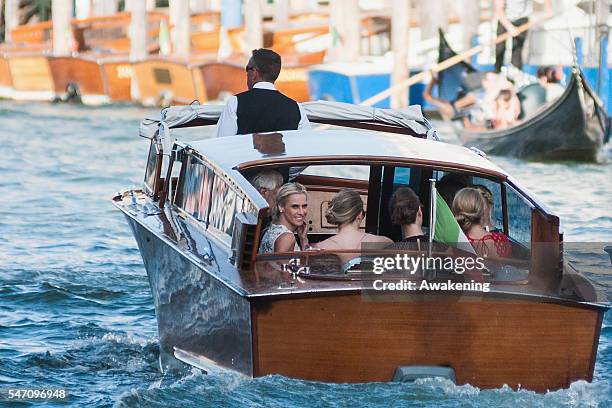 Guests leave the Aman Grand Canal Hotel to reach the church of the wedding of Bastian Schweinsteiger and Ana Ivanovic on July 13, 2016 in Venice,...