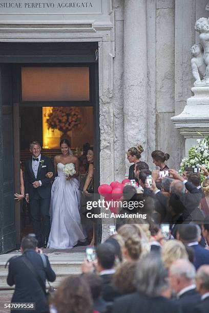 Bastian Schweinsteiger and Ana Ivanovic leave the church after their wedding on July 13, 2016 in Venice, Italy.