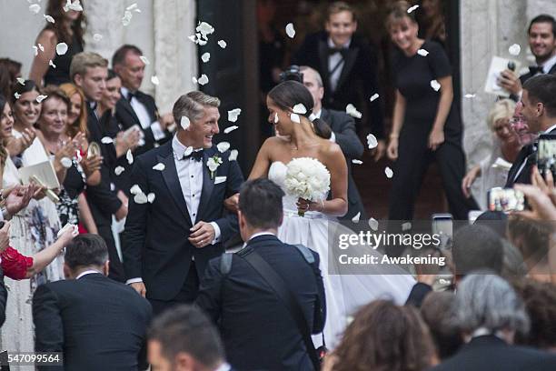 Bastian Schweinsteiger and Ana Ivanovic leave the church after their wedding on July 13, 2016 in Venice, Italy.