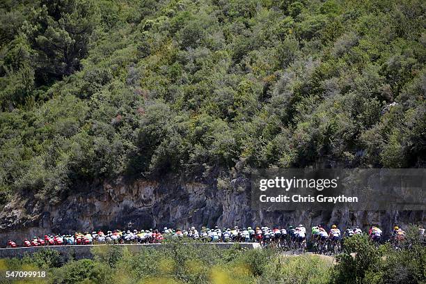 The peloton rides through the french countryside during stage eleven of the 2016 Le Tour de France a 162.5km stage from Carcassonne to Montpellier on...