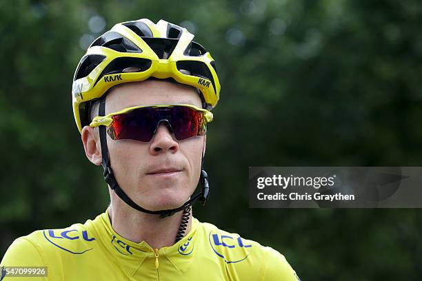 Christopher Froome of Great Britain riding for Team Sky in the yellow leader's jersey prepares to start stage eleven of the 2016 Le Tour de France a...