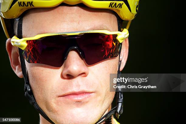 Christopher Froome of Great Britain riding for Team Sky in the yellow leader's jersey prepares to start stage eleven of the 2016 Le Tour de France a...