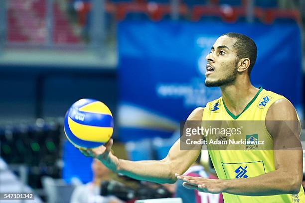 Ricardo Lucarelli Santos De Souza from Brazil serves the ball while the FIVB World League volleyball match between Brazil and Italy at Tauron Arena...