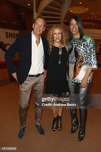 Henry Maske, Katja Burkard and Jorge Gonzalez arrives for the Ballet Revolucion show premiere at the Philharmonie on July 13, 2016 in Cologne,...