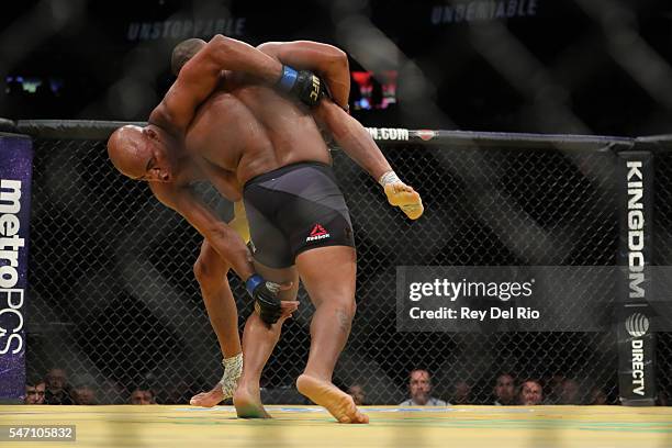 Daniel Cornier looks to take down Anderson Siva during the UFC 200 event at T-Mobile Arena on July 9, 2016 in Las Vegas, Nevada.