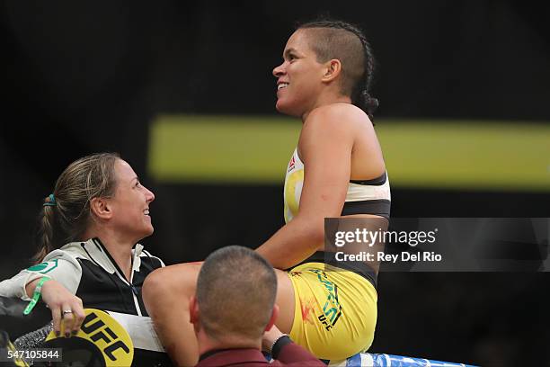 Amanda Nunes celebrates his victory over Miesha Tate during the UFC 200 event at T-Mobile Arena on July 9, 2016 in Las Vegas, Nevada.