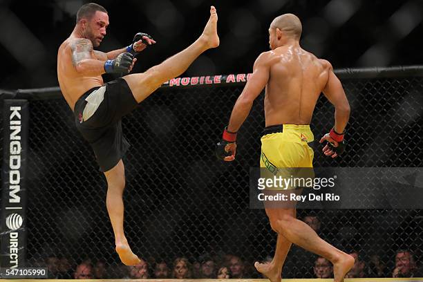Frankie Edgar looks to land a high kick on Jose Aldo during the UFC 200 event at T-Mobile Arena on July 9, 2016 in Las Vegas, Nevada.