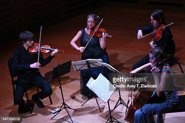 Ben Hancox on violin, Hannah Dawson on violin, Robin Ashwell on viola and Cara Berridge on cello of The Sacconi Quartet perform MozartÕs String...