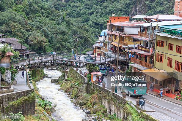 view of aguas calientes city, near machu picchu, peru. - machu picchu stock-fotos und bilder