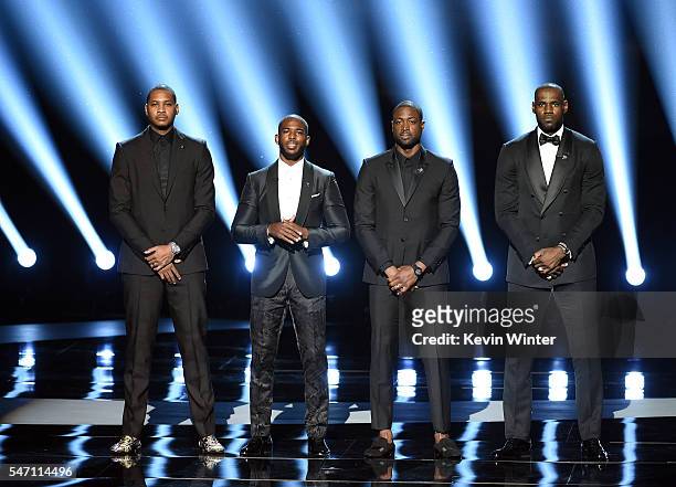 Players Carmelo Anthony, Chris Paul, Dwyane Wade and LeBron James speak onstage during the 2016 ESPYS at Microsoft Theater on July 13, 2016 in Los...