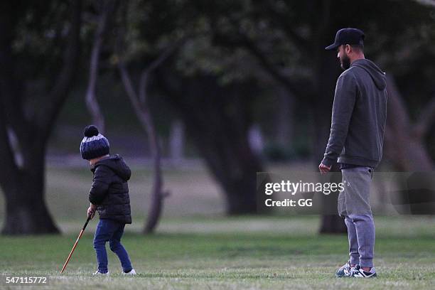 Guy Sebastian is seen teaching his son Hudson how to play golf on June 25, 2016 in Sydney, Australia.