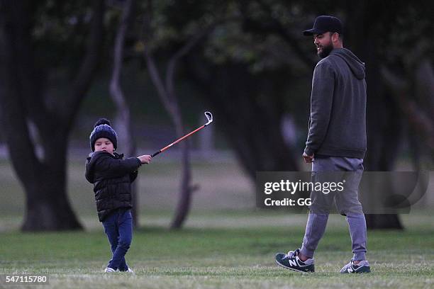 Guy Sebastian is seen teaching his son Hudson how to play golf on June 25, 2016 in Sydney, Australia.