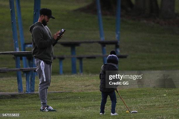 Guy Sebastian is seen teaching his son Hudson how to play golf on June 25, 2016 in Sydney, Australia.