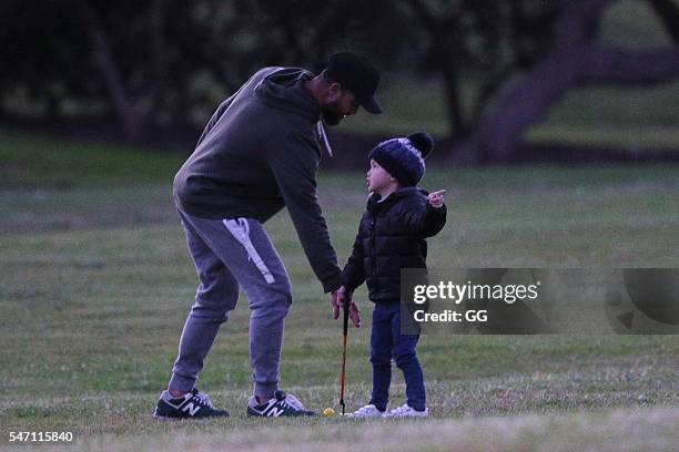 Guy Sebastian is seen teaching his son Hudson how to play golf on June 25, 2016 in Sydney, Australia.