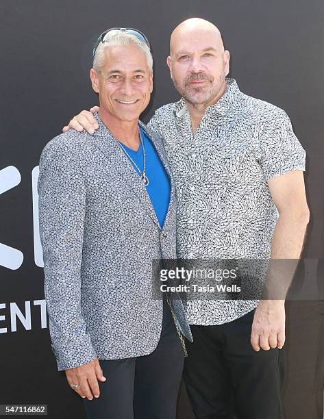 Diver Greg Louganis and actor Jason Stuart attend Greg Louganis' Pre- ESPY Awards Wheaties Breakfast for Champions at The Starving Artists Project on...