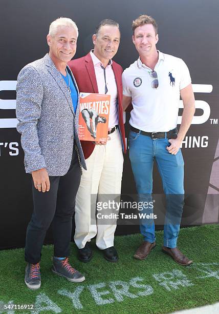 Diver Greg Louganis, Johnny Chaillott and actor Bryan Batt attend Greg Louganis' Pre- ESPY Awards Wheaties Breakfast for Champions at The Starving...
