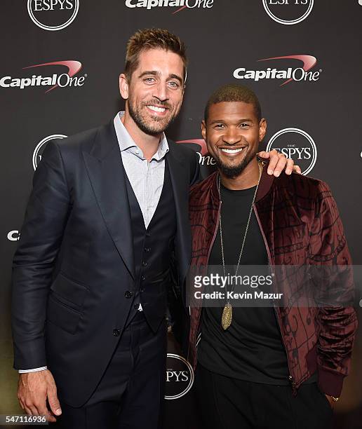 Player Aaron Rodgers and recording artist Usher attend the 2016 ESPYS at Microsoft Theater on July 13, 2016 in Los Angeles, California.