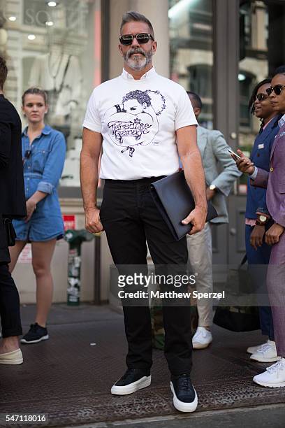 Garth Condit is seen attending the Suitsupply Presentation wearing Sacsi shirt, Unis pants, Public School shoes, and Tsatsas bag during New York...