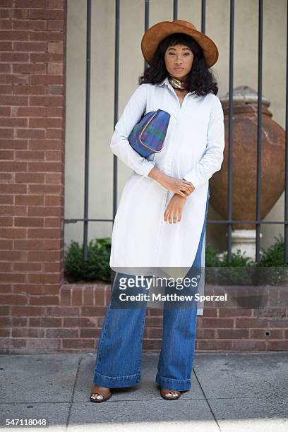 Candace Marie is seen attending the Artistix with Andy Hilfiger Presentation wearing a Zara hat, Shopbop tunic, Bergdorf pants, and Tobi shoes during...