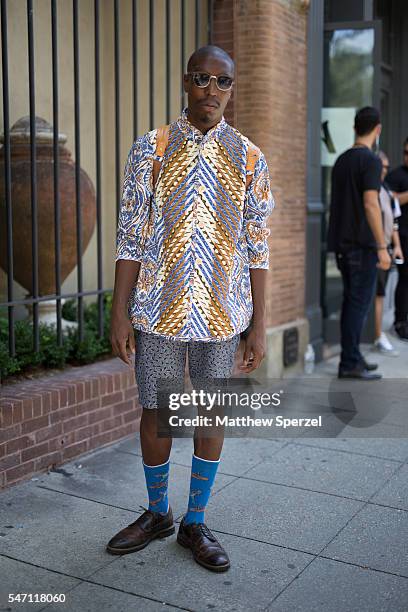 Jevin Kinard is seen attending the Artistix with Andy Hilfiger Presentation wearing Dolce & Gabbana shirt, H&M shorts and socks, Allen Edmond shoes,...