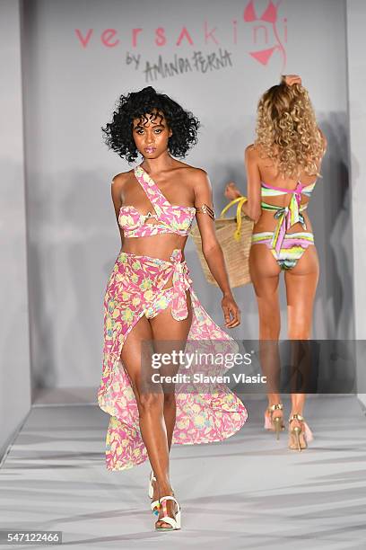 A model walks the runway at Versakini x Amanda Perna Runway Show Presented By Ivy at W South Beach on July 13, 2016 in Miami Beach, Florida.