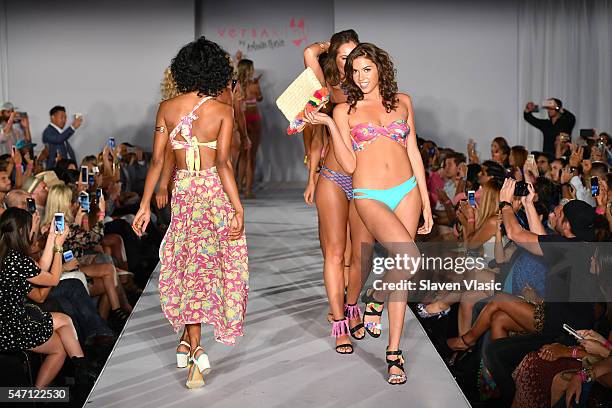 Models walk the runway during the finale at Versakini x Amanda Perna Runway Show Presented By Ivy at W South Beach on July 13, 2016 in Miami Beach,...