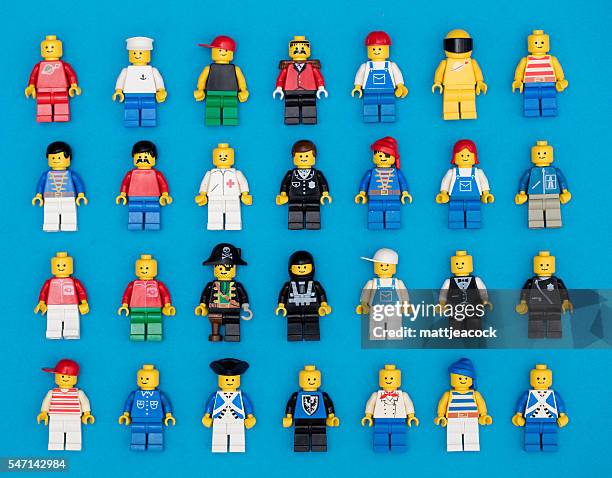 lego figures background - plastic block stock pictures, royalty-free photos & images