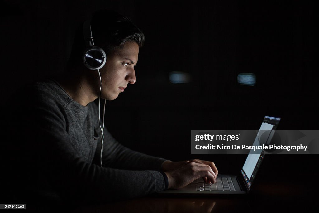 Young man using laptop