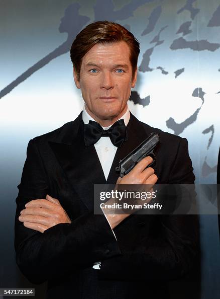 The wax figure of actor Roger Moore portraying James Bond is... News ...