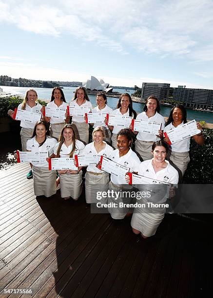 Players from the Australian Women's Sevens Rugby Teams pose during the Australian Olympic Games rugby sevens team announcement at Museum of...