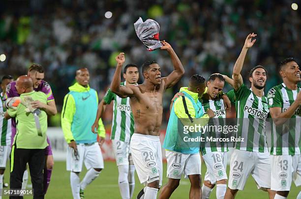 Players of Atletico Nacional celebrate after winning a second leg semi final match between Atletico Nacional and Sao Paulo as part of Copa...